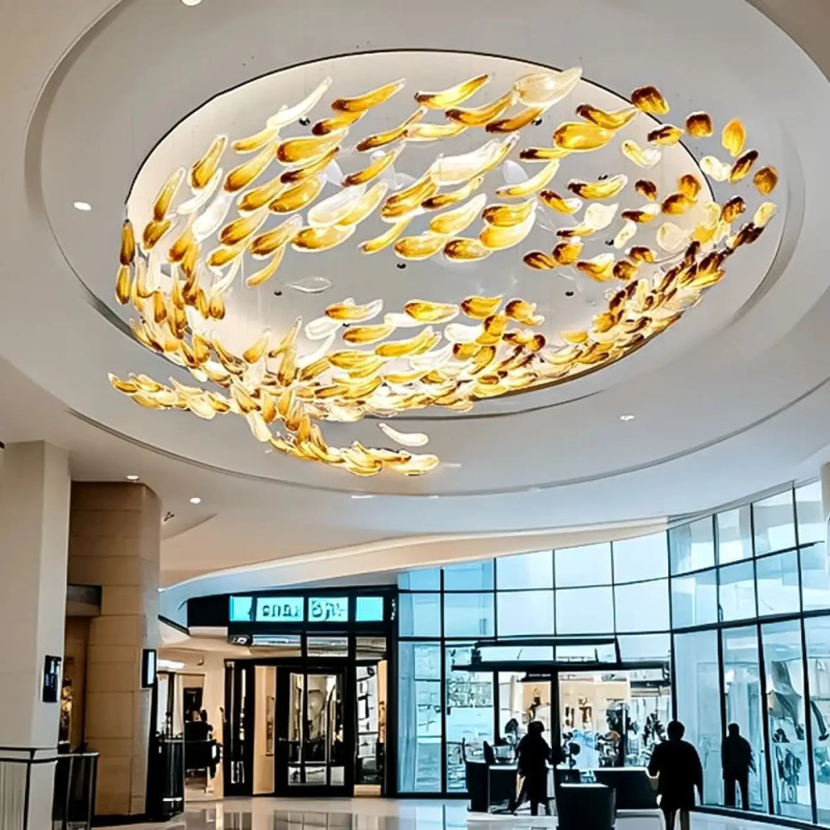 Suspension Cascade Cristal et Feuilles Dorées – Limette