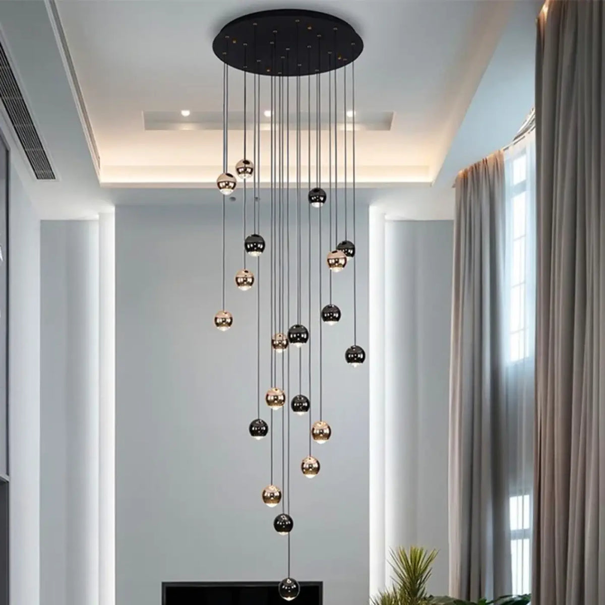 Suspension Cascade Boules Noires et Dorées – Zomon