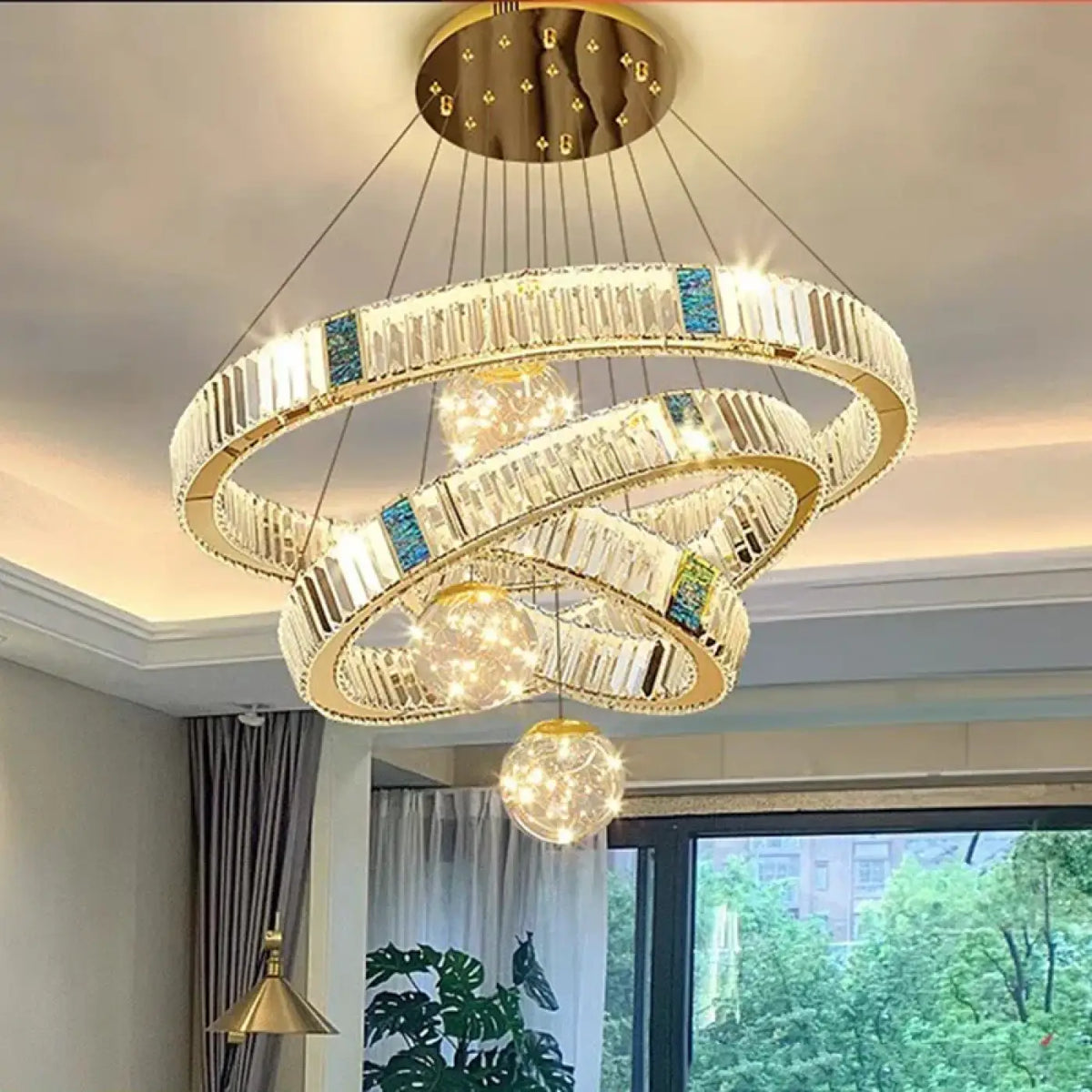 Suspension LED Cristal et Anneaux Dorés – Prosis