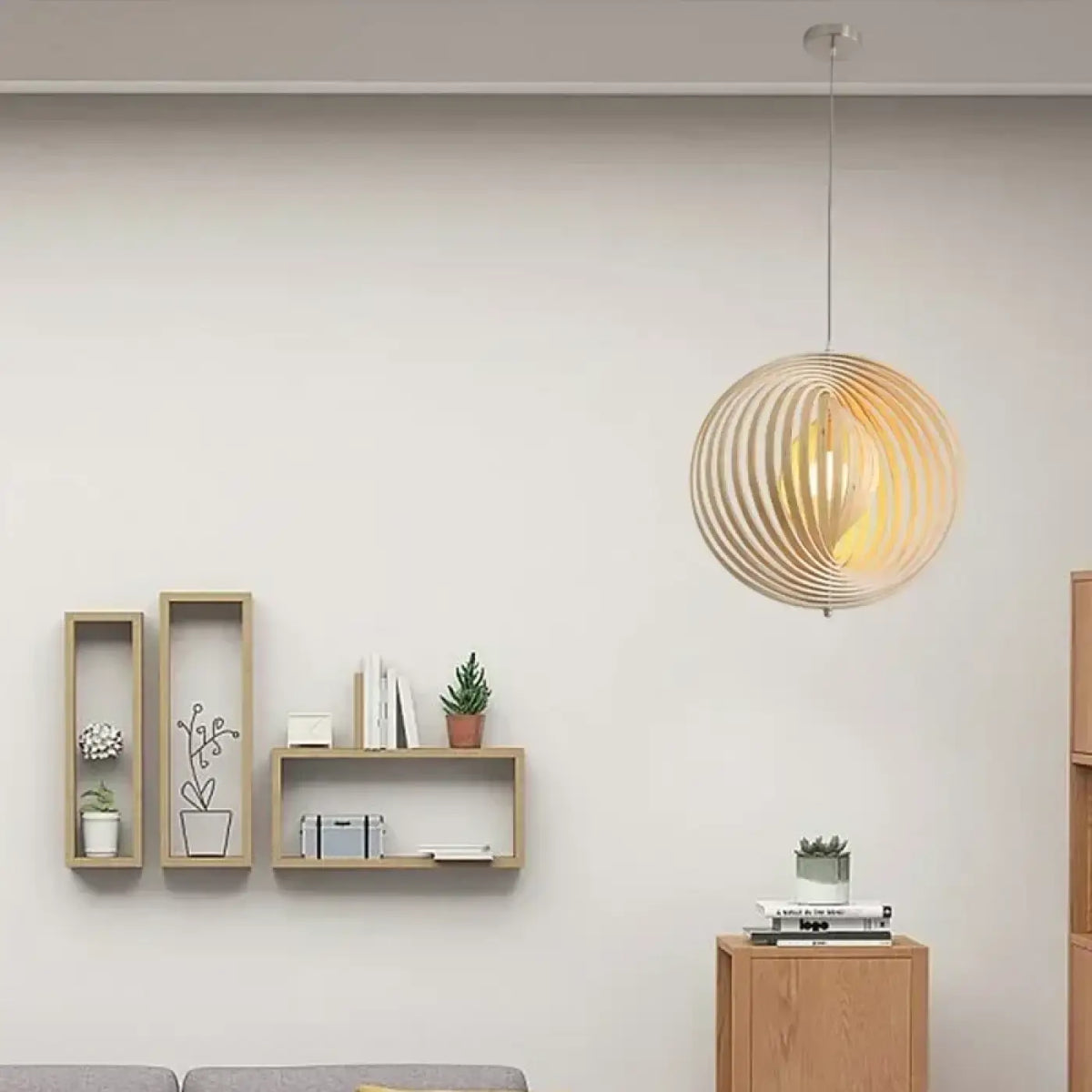 Suspension Boule en Bois Ajouré – Sovio