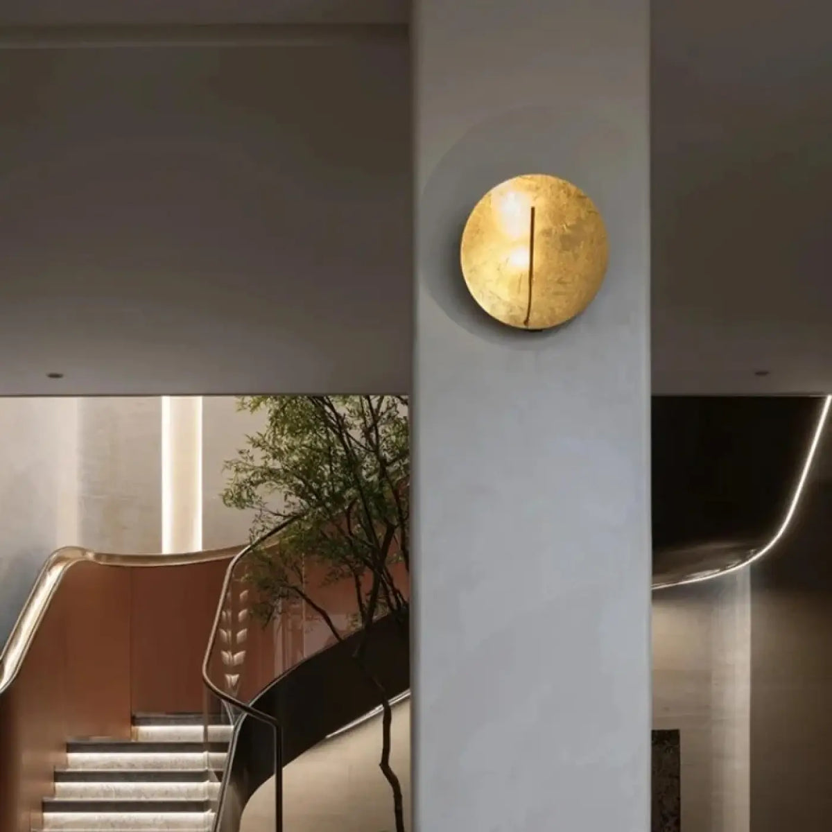 Applique Murale Ronde Dorée Effet Lune – Zera
