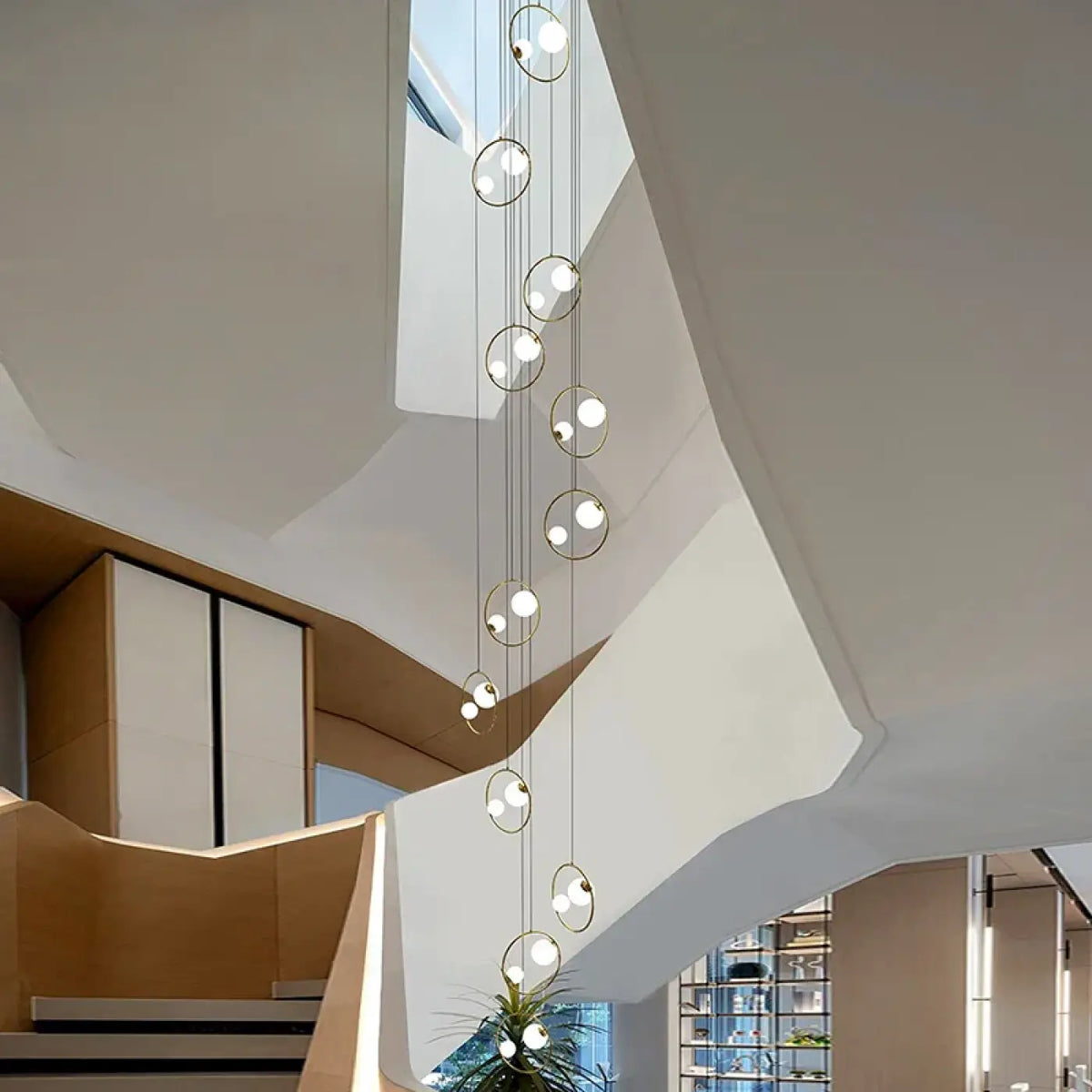 Suspension Cascade LED Sphères Dorées – Tilane