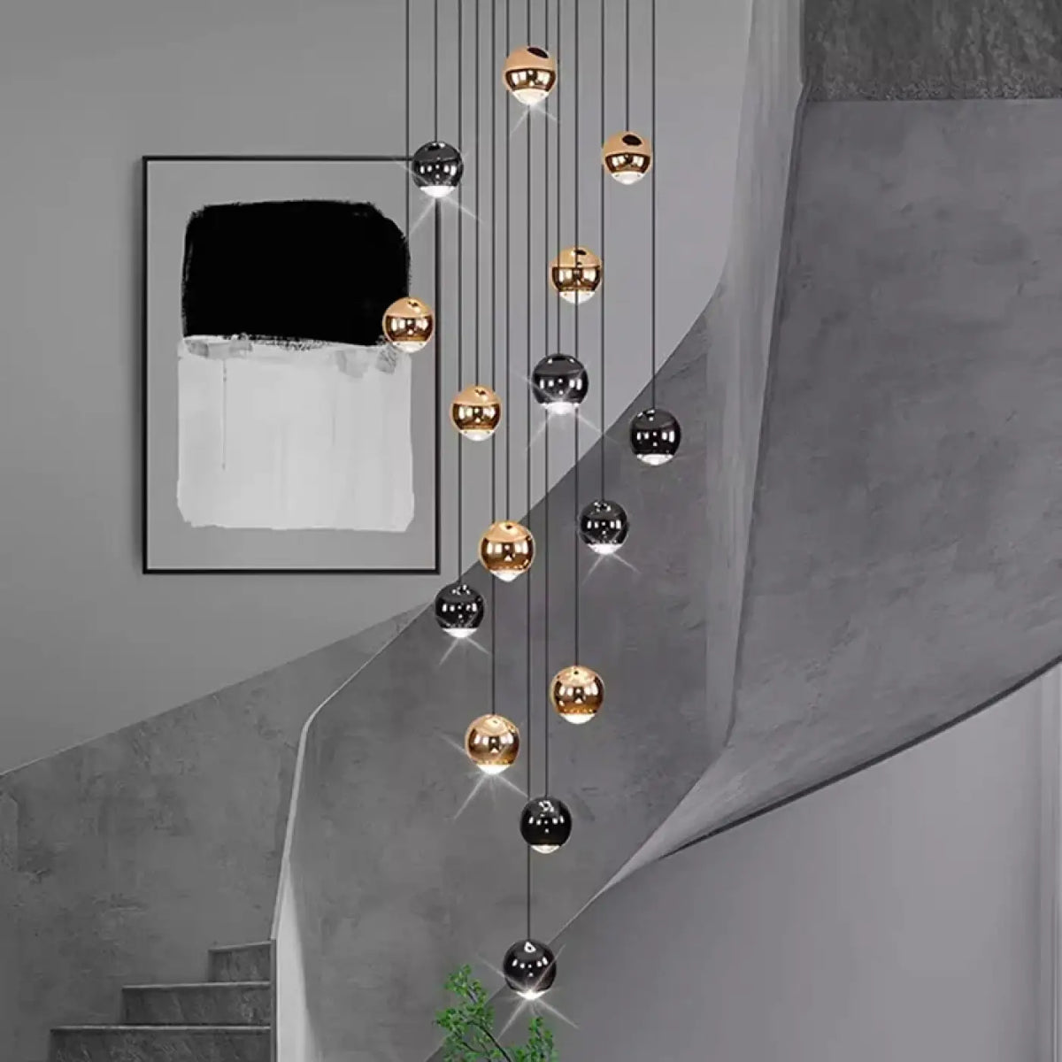 Suspension Cascade Boules Noires et Dorées – Zomon