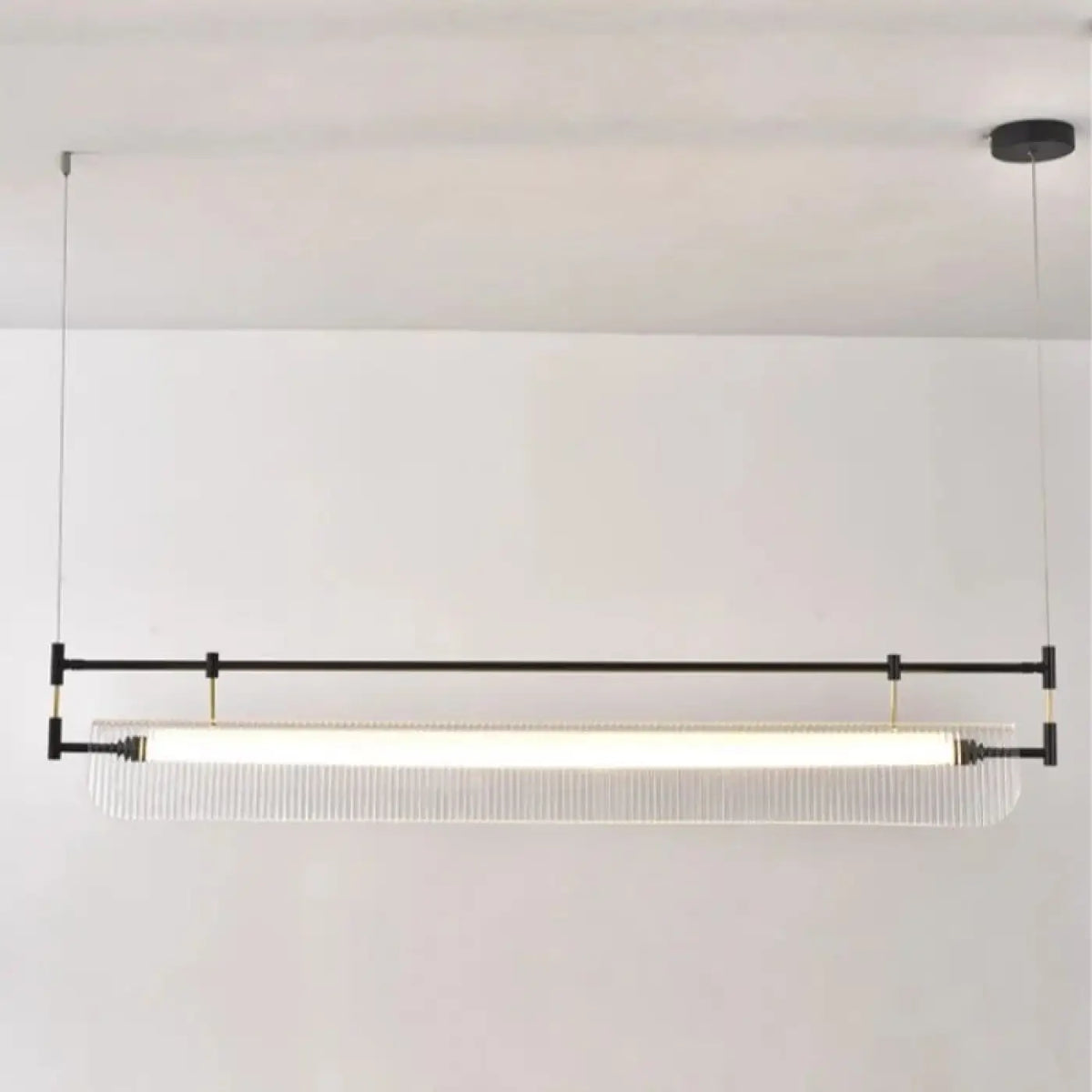 Suspension à Tube Lumineux – Nédette